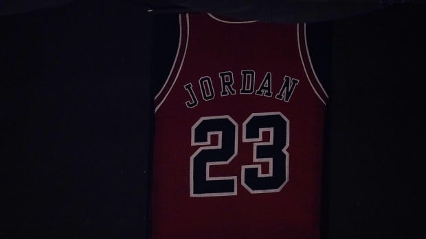 Apr 26, 2021; Miami, Florida, USA; The jersey of former Chicago Bulls player Michael Jordan hangs from the rafters of the Miami Heat  American Airlines Arena.